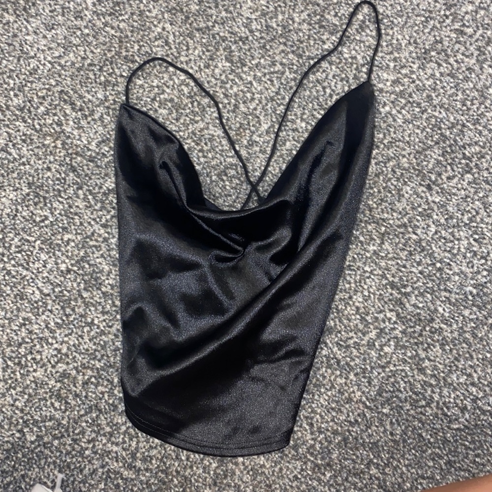 Sheer top with open back. Great for a date night.